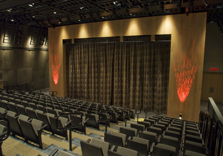 The Canadian War Museum in Ottawa houses the Barney Danson Theatre, an auditorium with rows of seats and a red curtain.