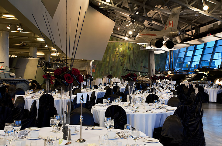 The Lebreton Gallery is full of tables and chairs in Canadian War Museum.