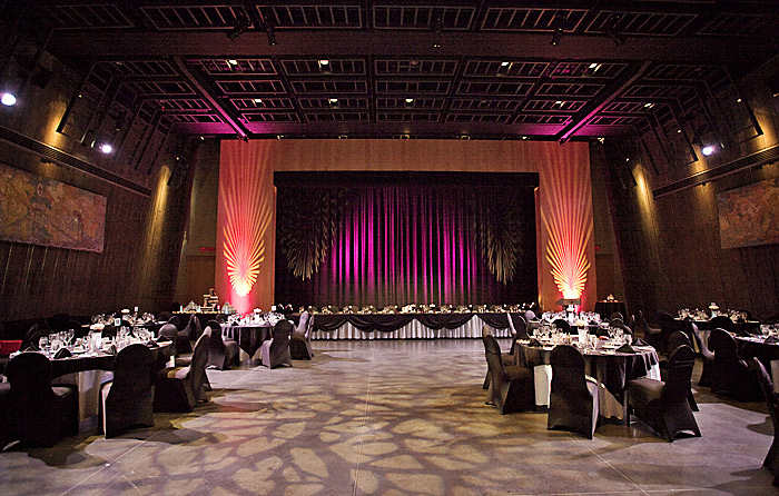 The Barney Danson Theatre with tables and chairs in the Canadian War Museum.