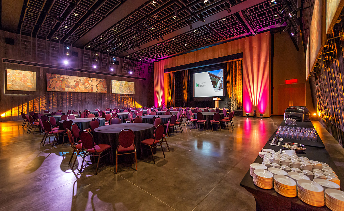 The Barney Danson Theatre with tables and chairs located in the Canadian War Museum in Ottawa.