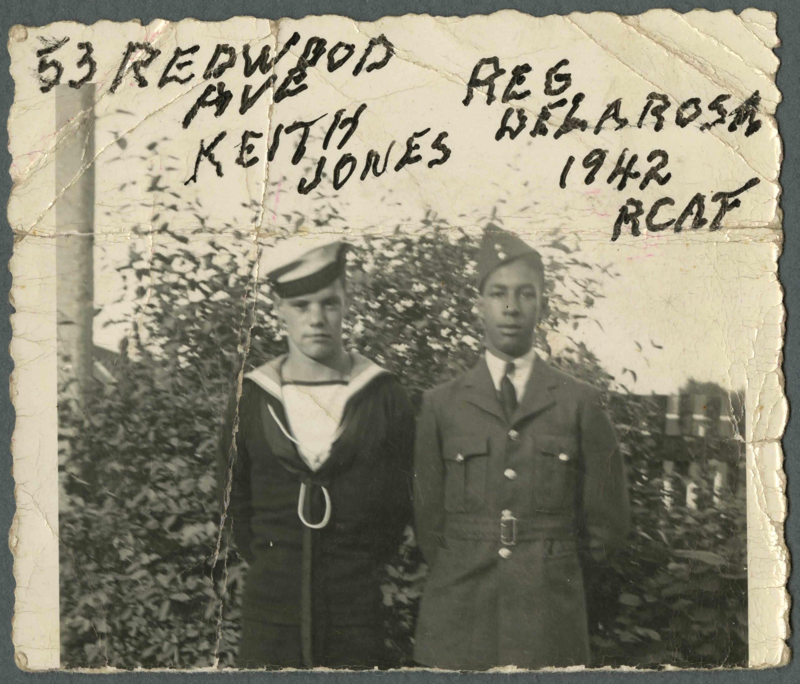 Two men in uniform standing next to each other at the Canadian War Museum in Ottawa.