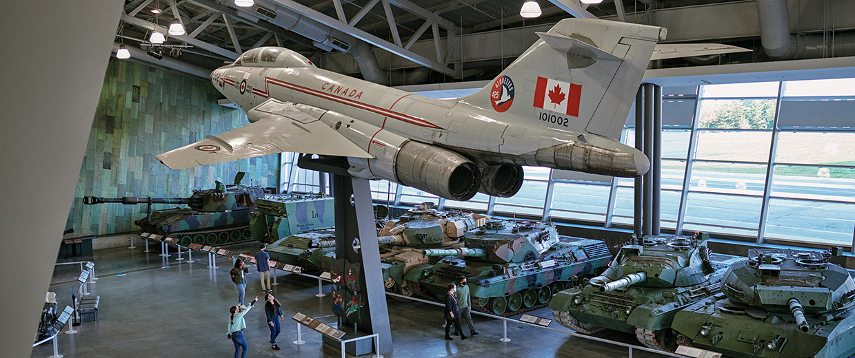 The Canadian War Museum in Ottawa showcases a historic plane hanging from the ceiling.