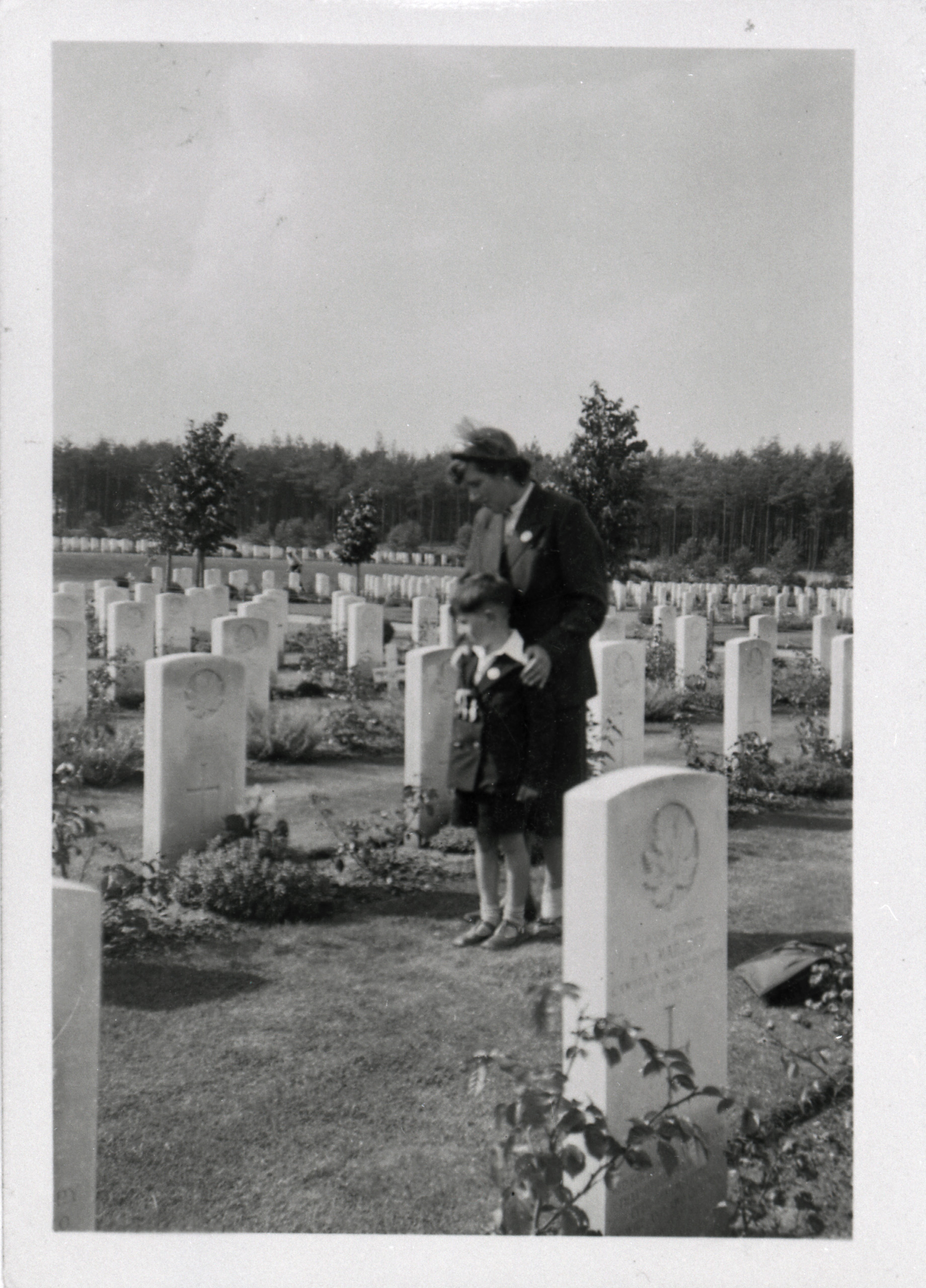 A woman and a man standing in the Canadian War Museum, in Ottawa.