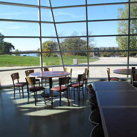 A circular table in the middle of a room at the Canadian War Museum.