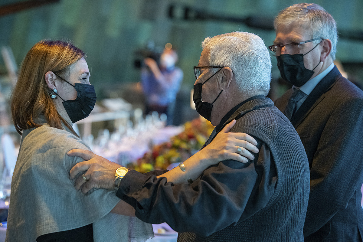 A group of people wearing face masks at the Canadian War Museum in Ottawa.