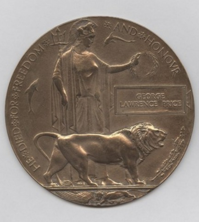 A bronze medal featuring a woman holding a lion, displayed at the Canadian War Museum in Ottawa.