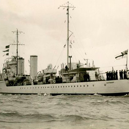 A large military ship in the water.