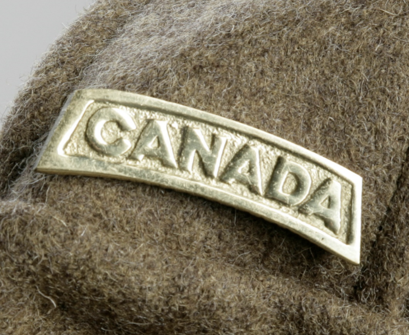 A close up of a Canada shoulder title