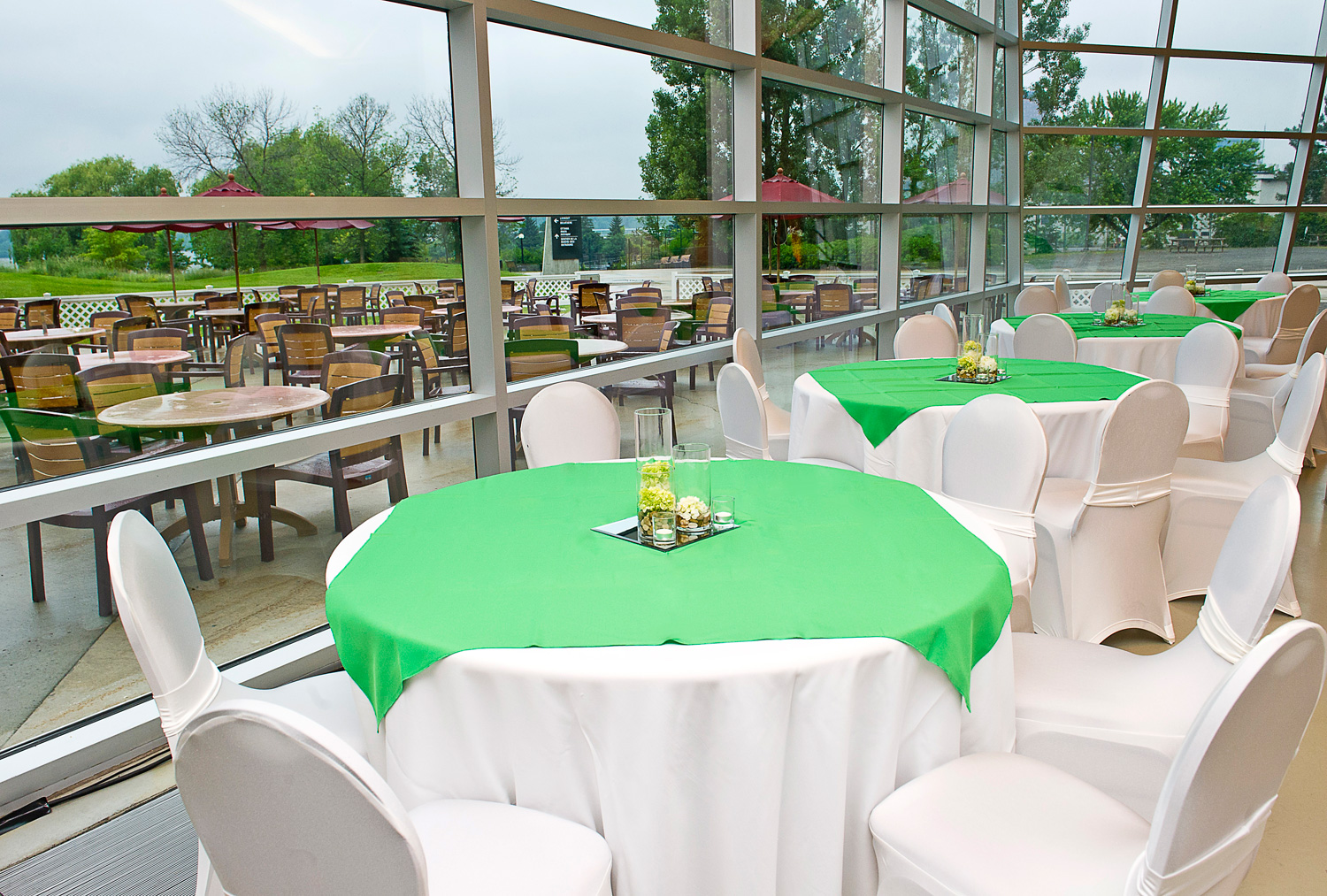 Green tablecloths and white tablecloths on a table in the Café at the Canadian War Museum in Ottawa.