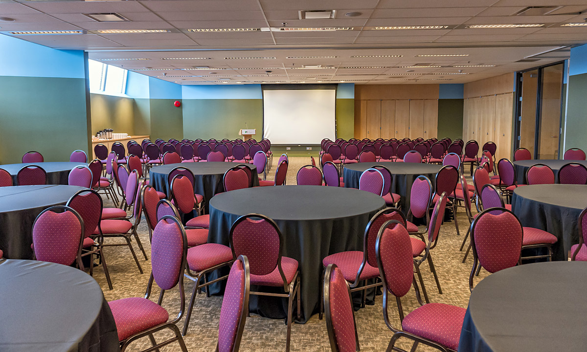 A large Atelier room with tables and chairs located at the Canadian War Museum in Ottawa.