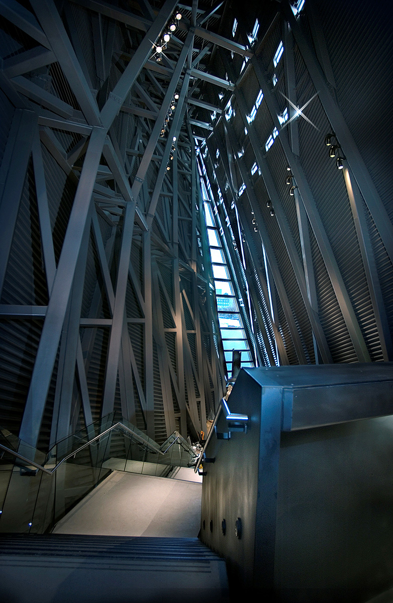 The Canadian War Museum in Ottawa, housing a vast collection of artifacts, prominently features a building with abundant metal elements.