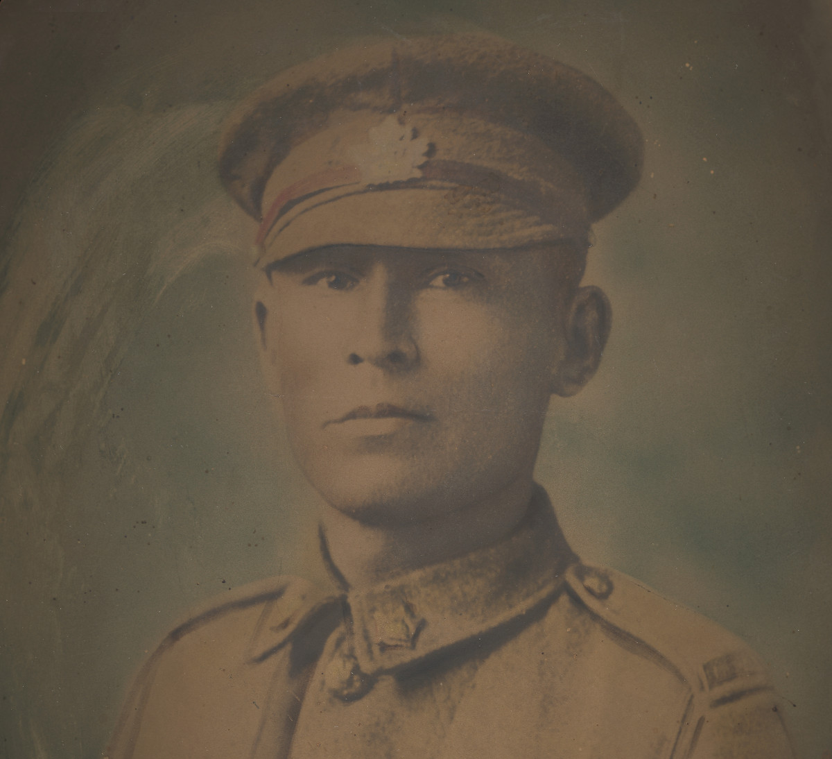 An old photograph of a man in a military uniform.