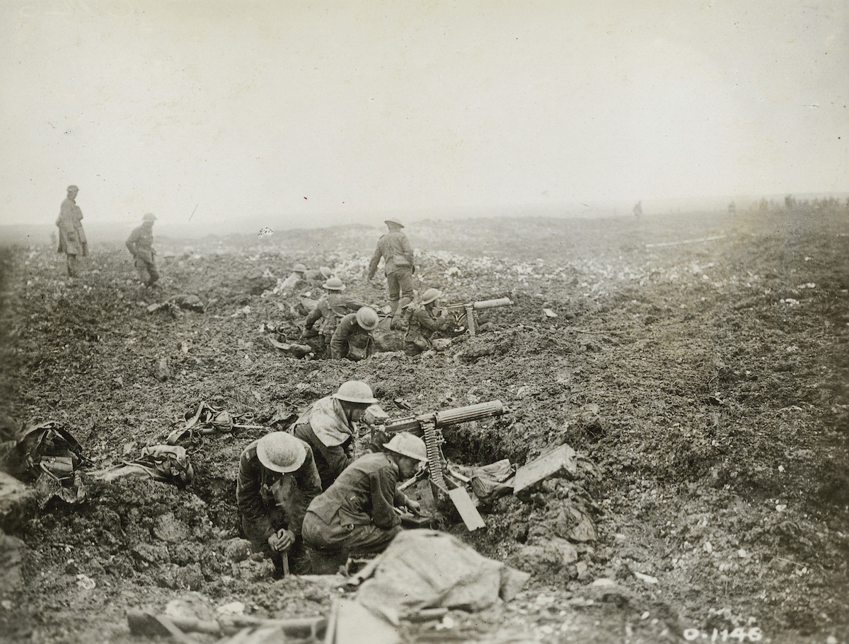 A group of soldiers working in a trench.