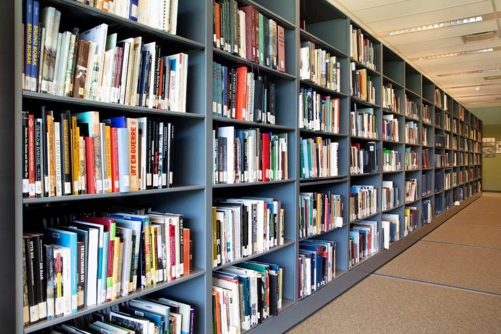 Books on bookshelf in library