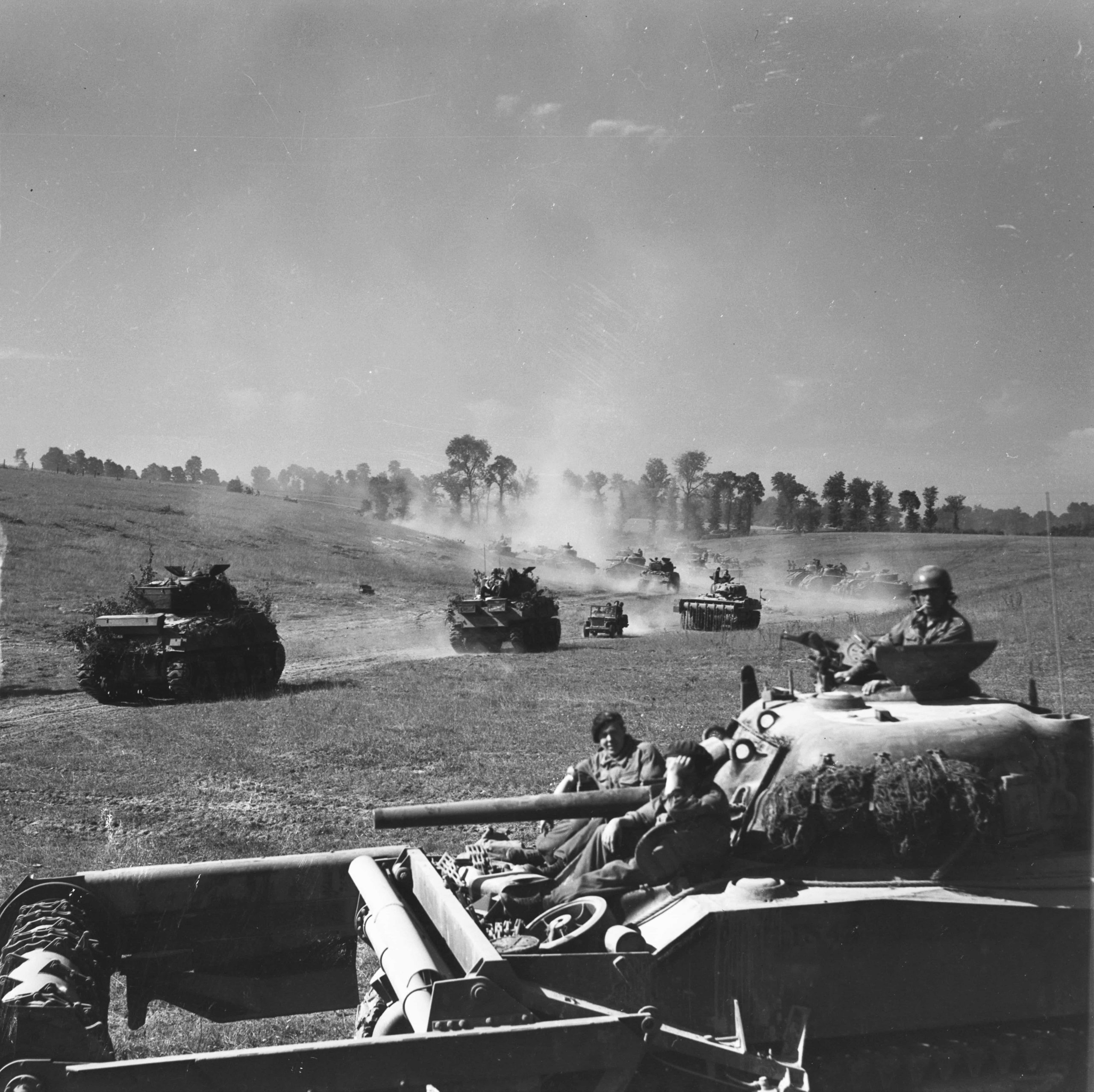 An old black and white photo of a group of tanks displayed at the Canadian War Museum in Ottawa.