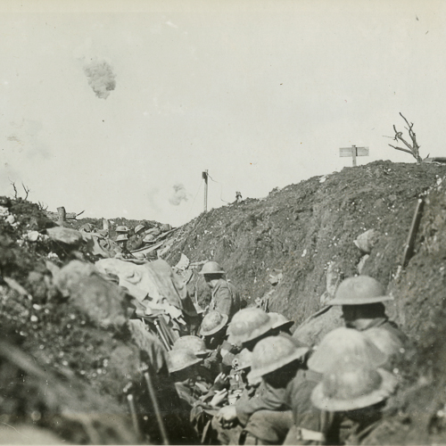 Soldiers lined up in the trenches waiting for war.